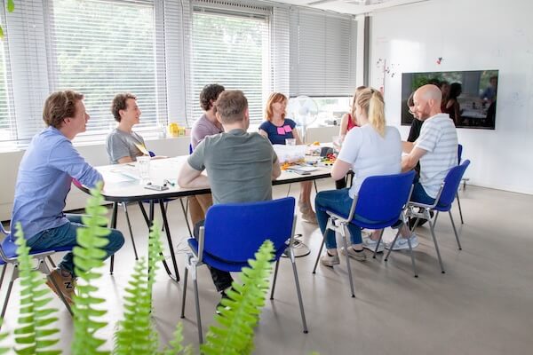 Team receiving guidance in improving collaboration