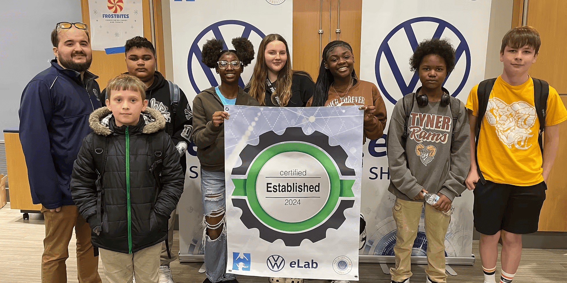 A group photo of students at Tyner Middle/ High Academy with their eLab instructor.