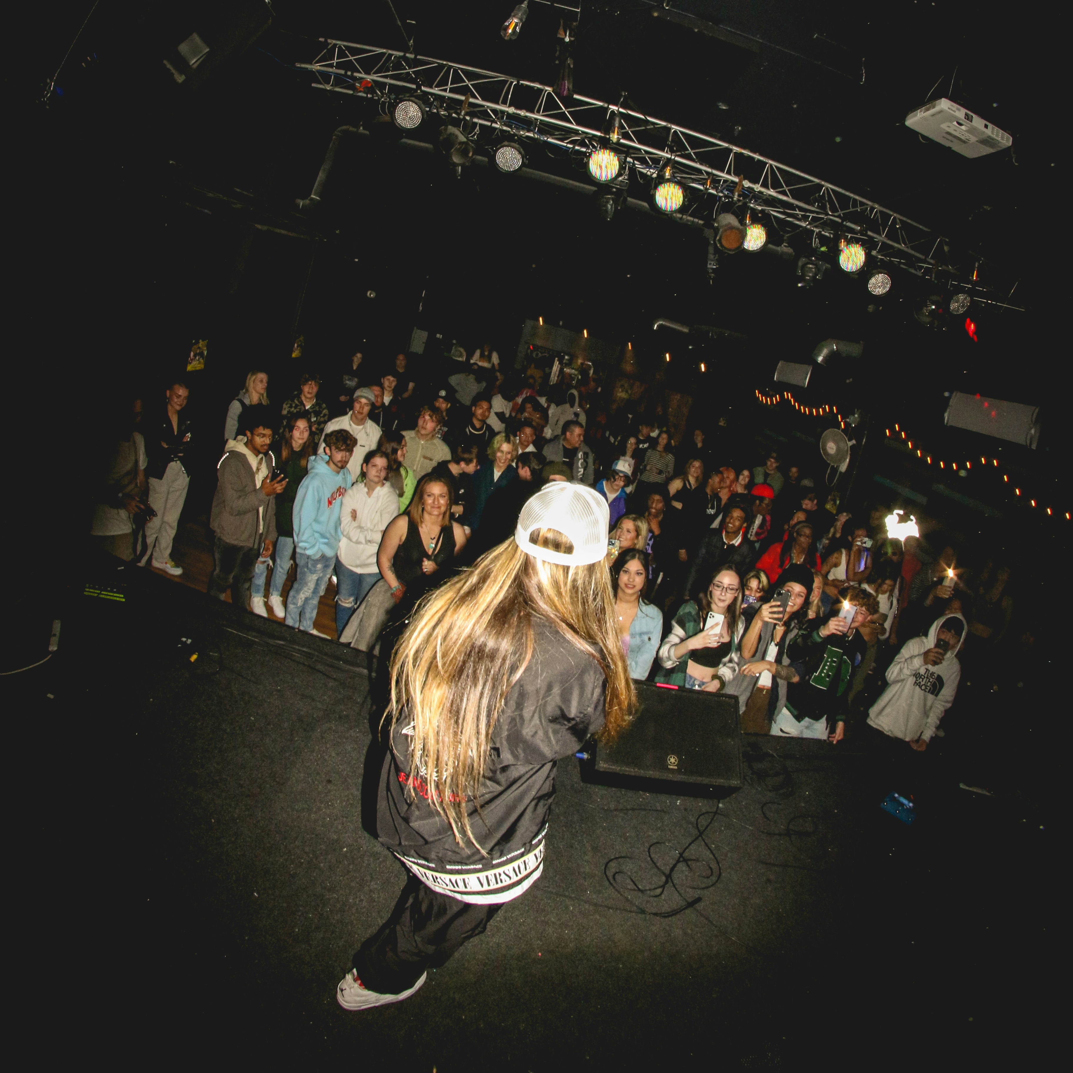 girl rapping on stage