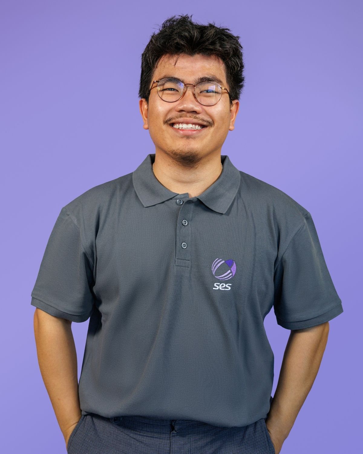 two black water bottles with bold white prints on each.