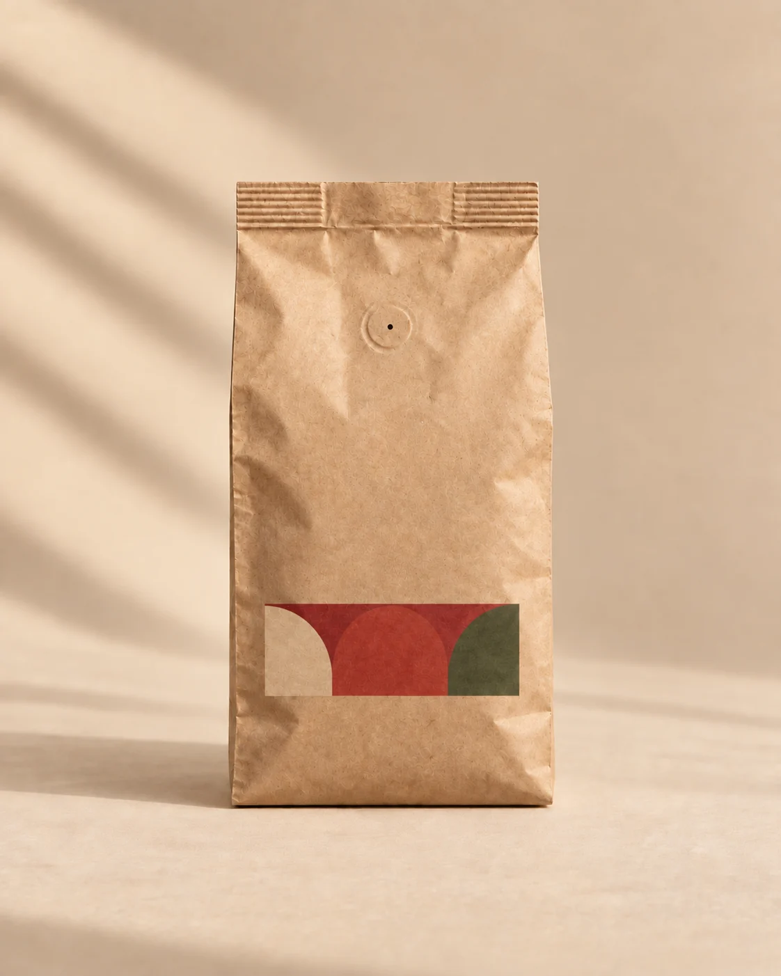 Stone Fruit Lot, Kenyan coffee in a 250 g kraft bag with a red arch artwork panel