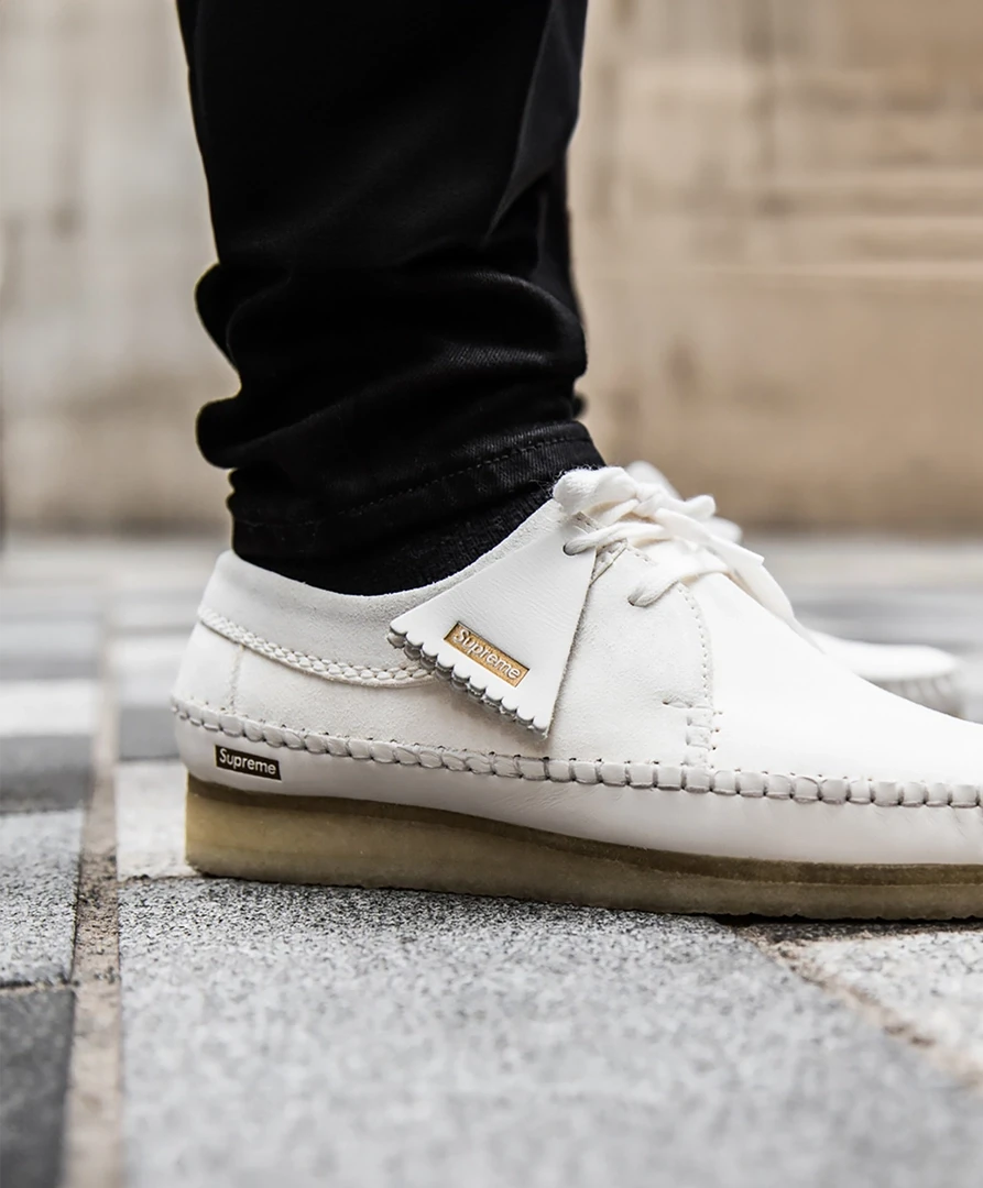 Clarks Originals × Supreme Wallabee worn on foot in a street setting
