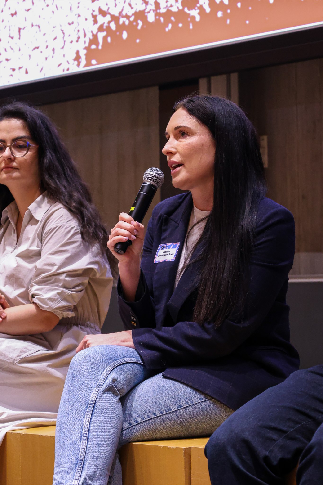 Panel speaker answering questions during EthereumZüri discussion session