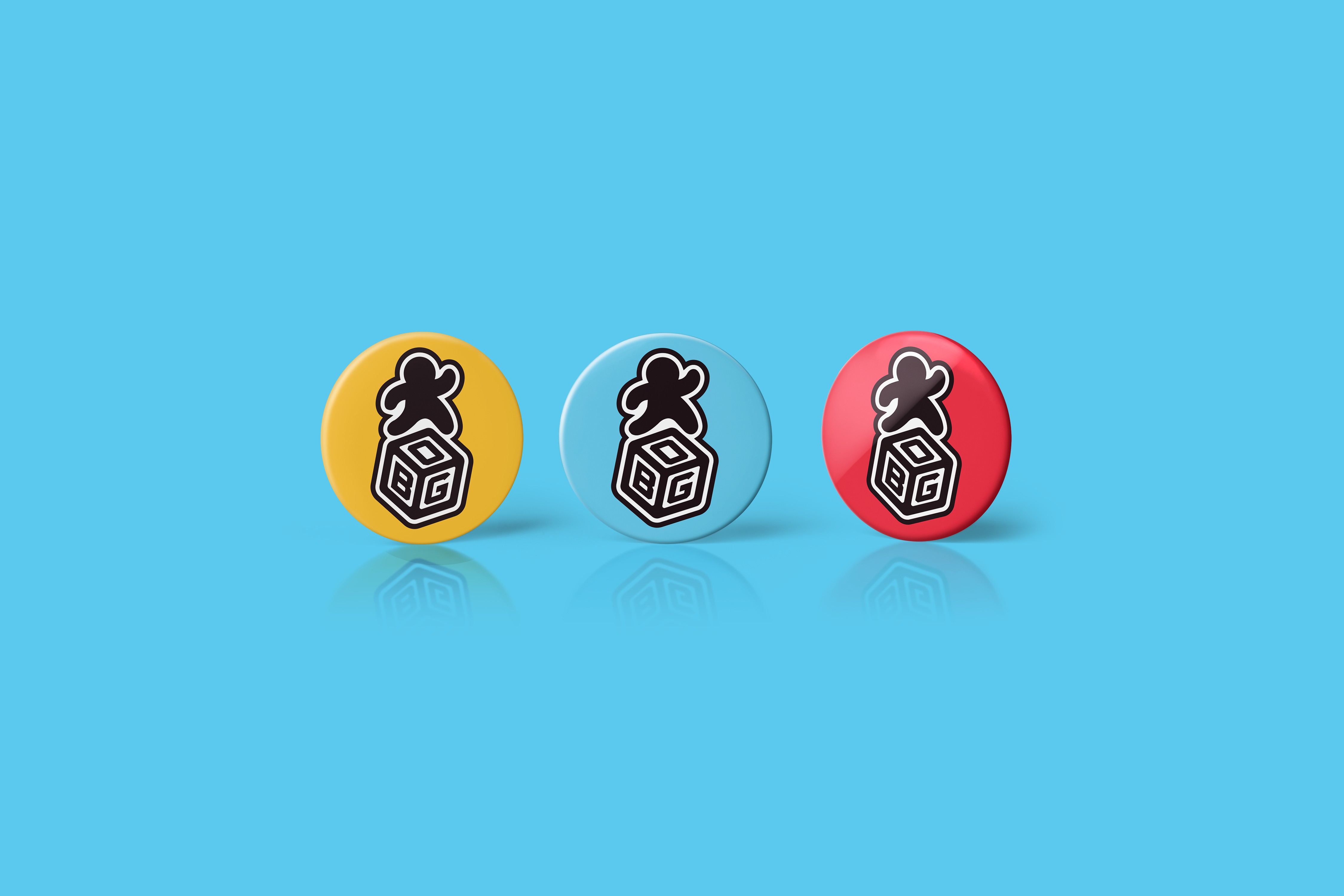 OBG yellow, blue and red button mockup.