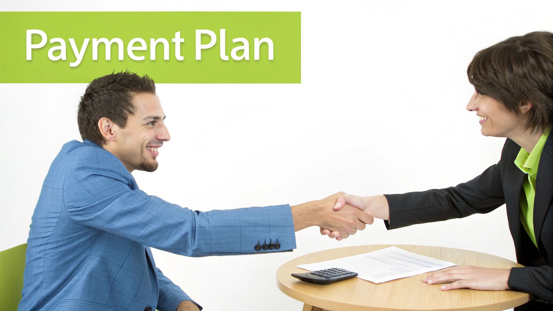 Two people shaking hands over a table with a payment plan document and calculator, symbolizing agreement.