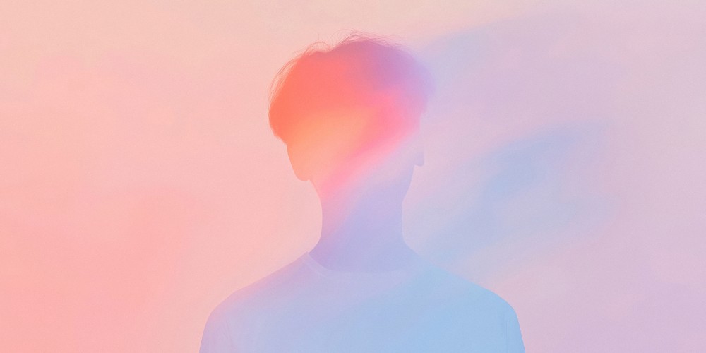 Abstract human silhouette with soft gradients representing identity, reflection, and inner awareness.