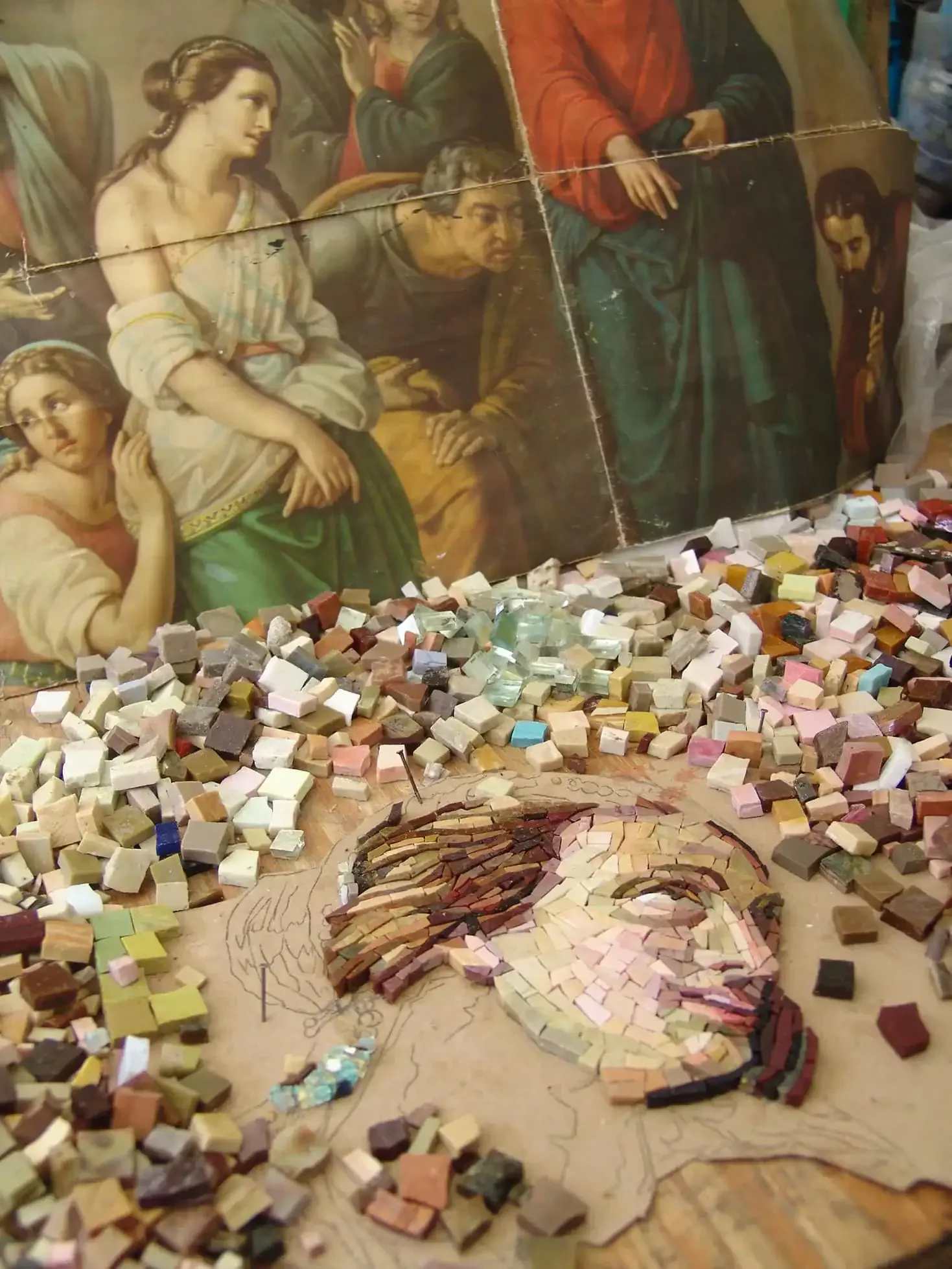 Religious mosaic of Mary Magdalene with mosaic tiles and classical art background.