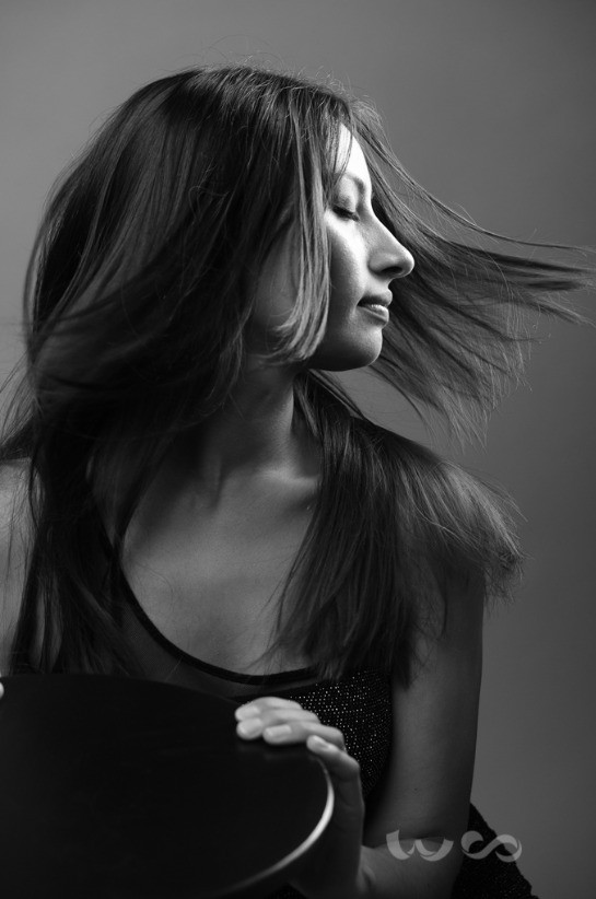 Side view of Gabriela in black and white