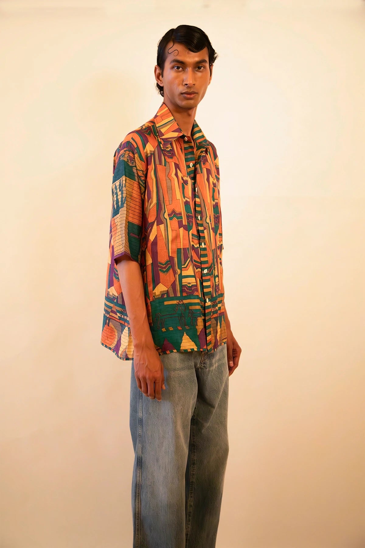 Upcycled vintage cotton shirt featuring a bold multicoloured abstract print, handcrafted with a focus on slow fashion, circular design, and artisanal heritage
