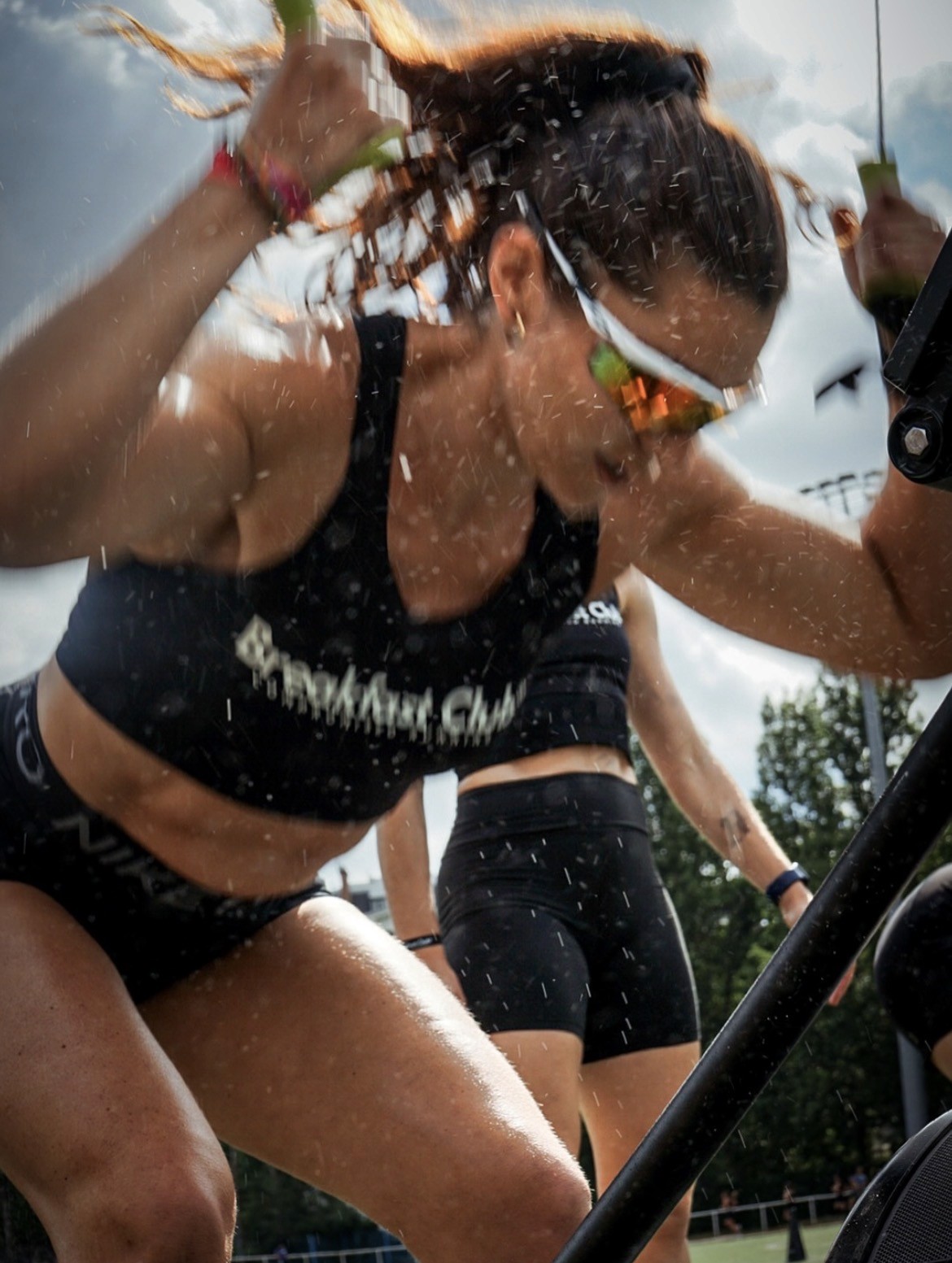 image of a lady in a blue puffer jacket