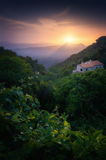 A narrow canyon with orange rocks