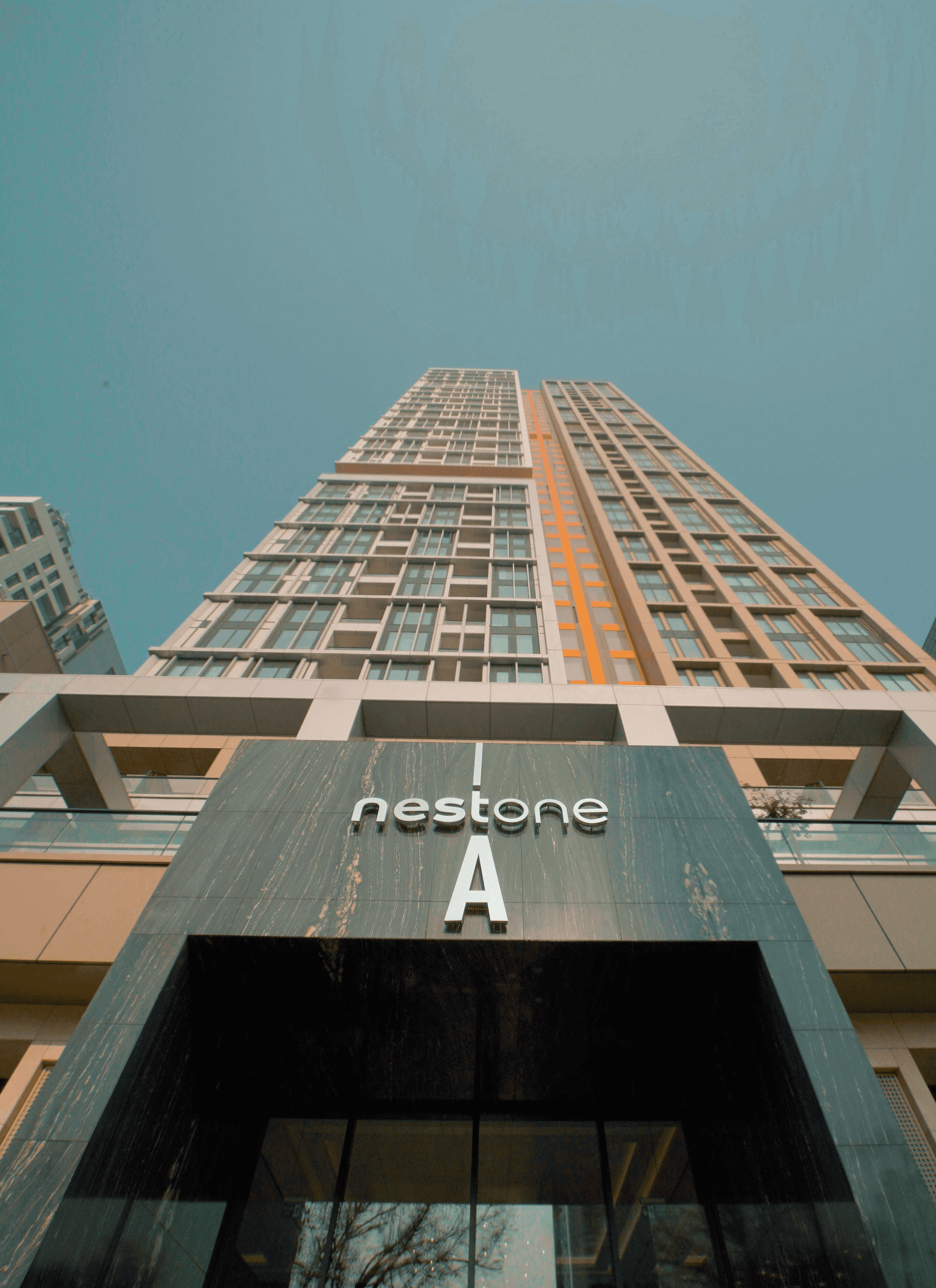 low-angle photo of blue building