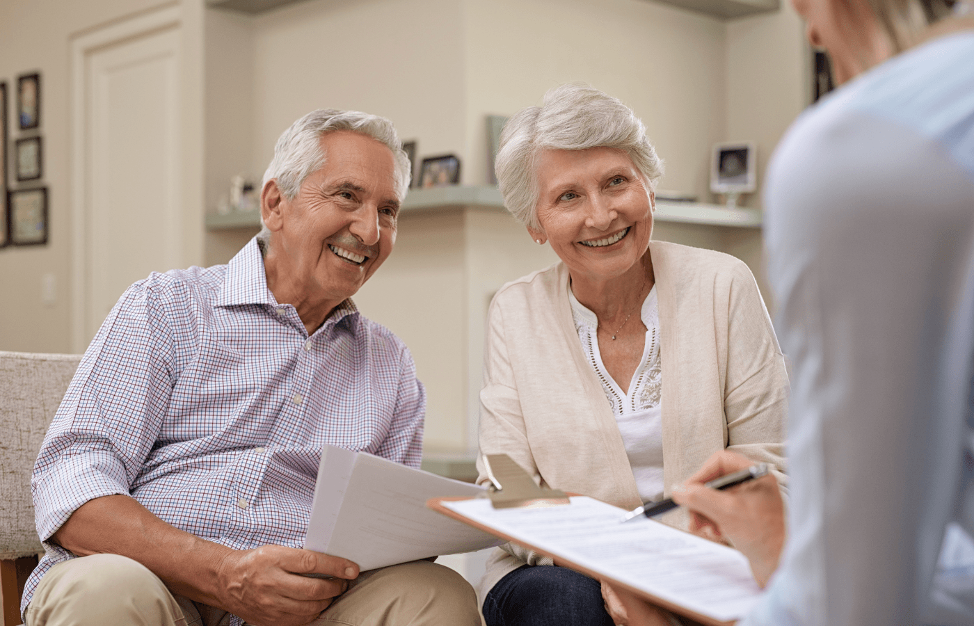 elderly couple reviewing paperwork