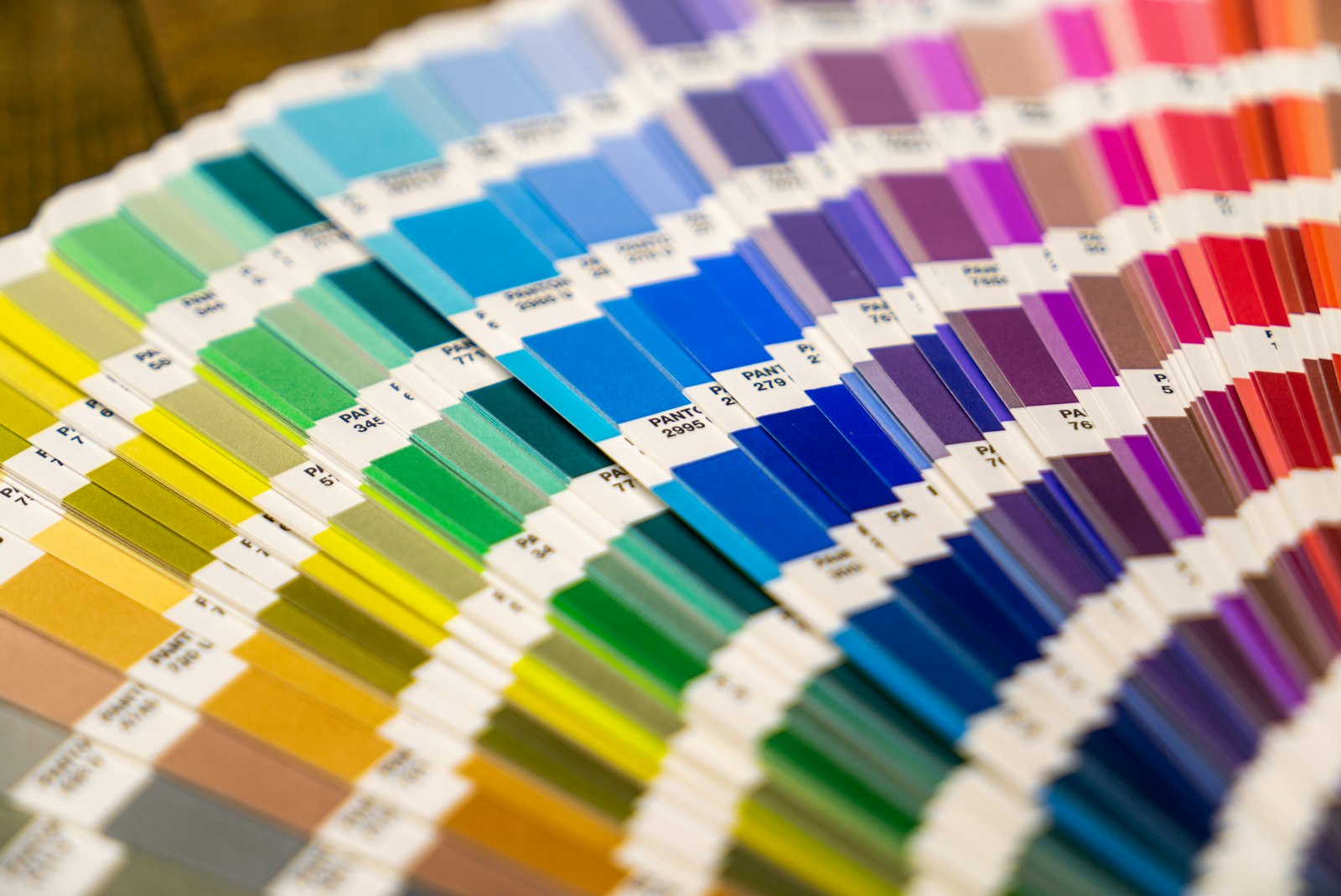 Color fan deck spread into a full spectrum of printed swatches