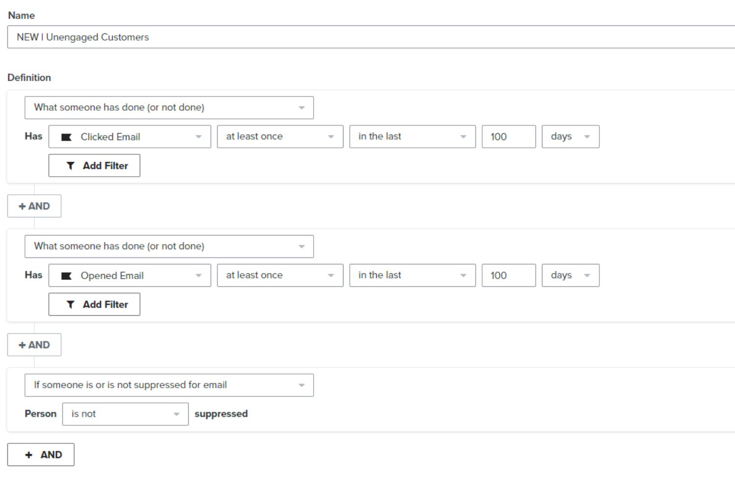 Klaviyo Segment Setup: A screenshot of a Klaviyo segment filter setup. The filter is set to segment customers who have clicked an email and opened an email at least once in the last 100 days. The setup includes a condition to exclude suppressed individuals, focusing on active, engaged customers.