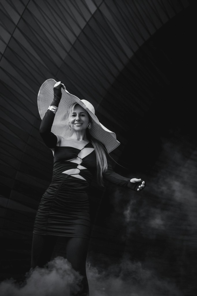 black and white lady wearing hat