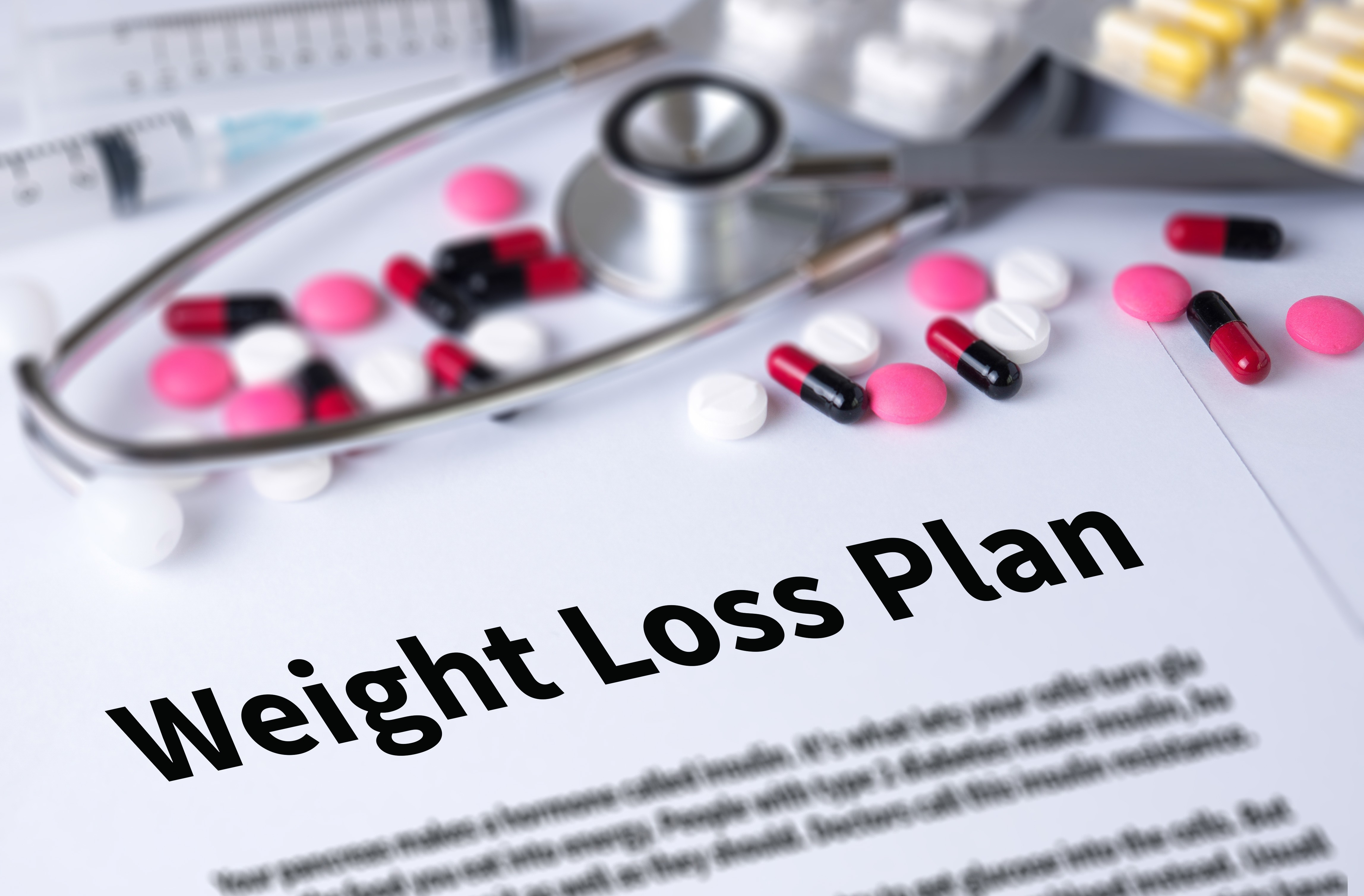 Customized weight loss plan with medications and stethoscope — A+P House Calls tailored weight loss program Long Island
