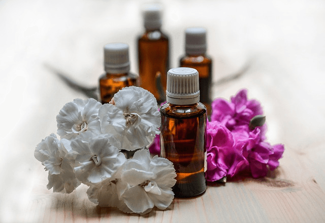 Bottles of essential oil, commonly used for its relaxing and calming lavender essential oil uses in aromatherapy and natural skincare.