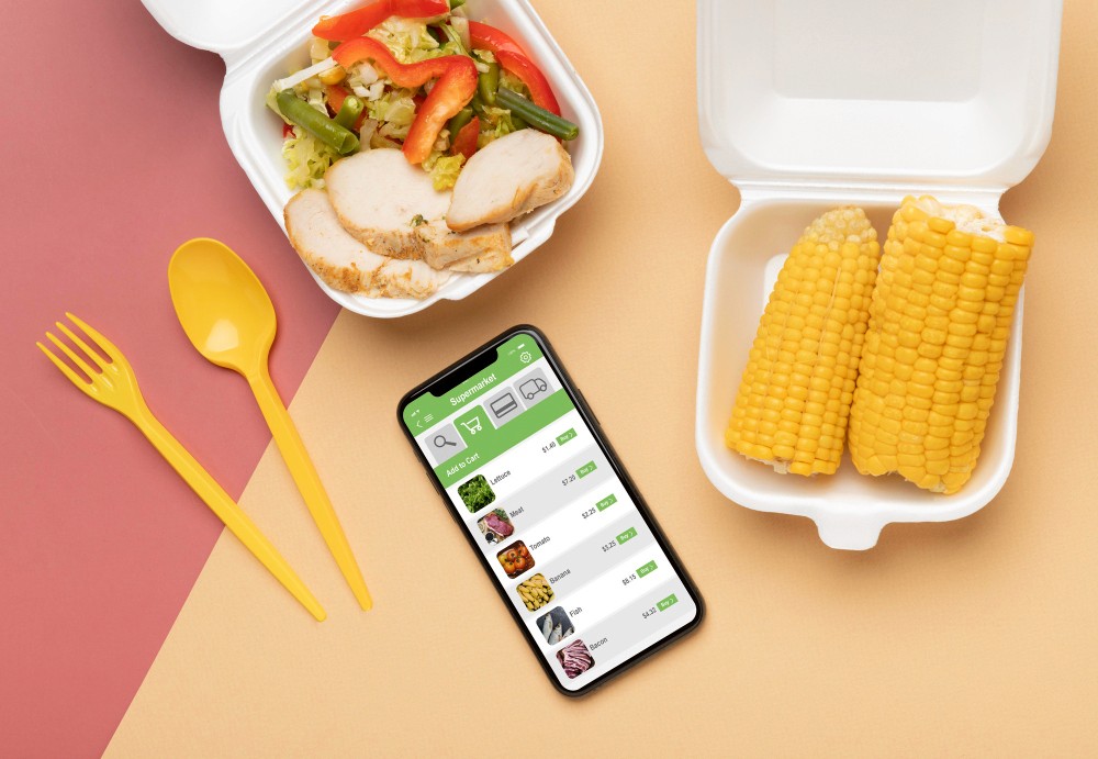 Top view food and phone arrangement