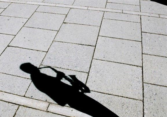 person sitting in a chair in front of a man