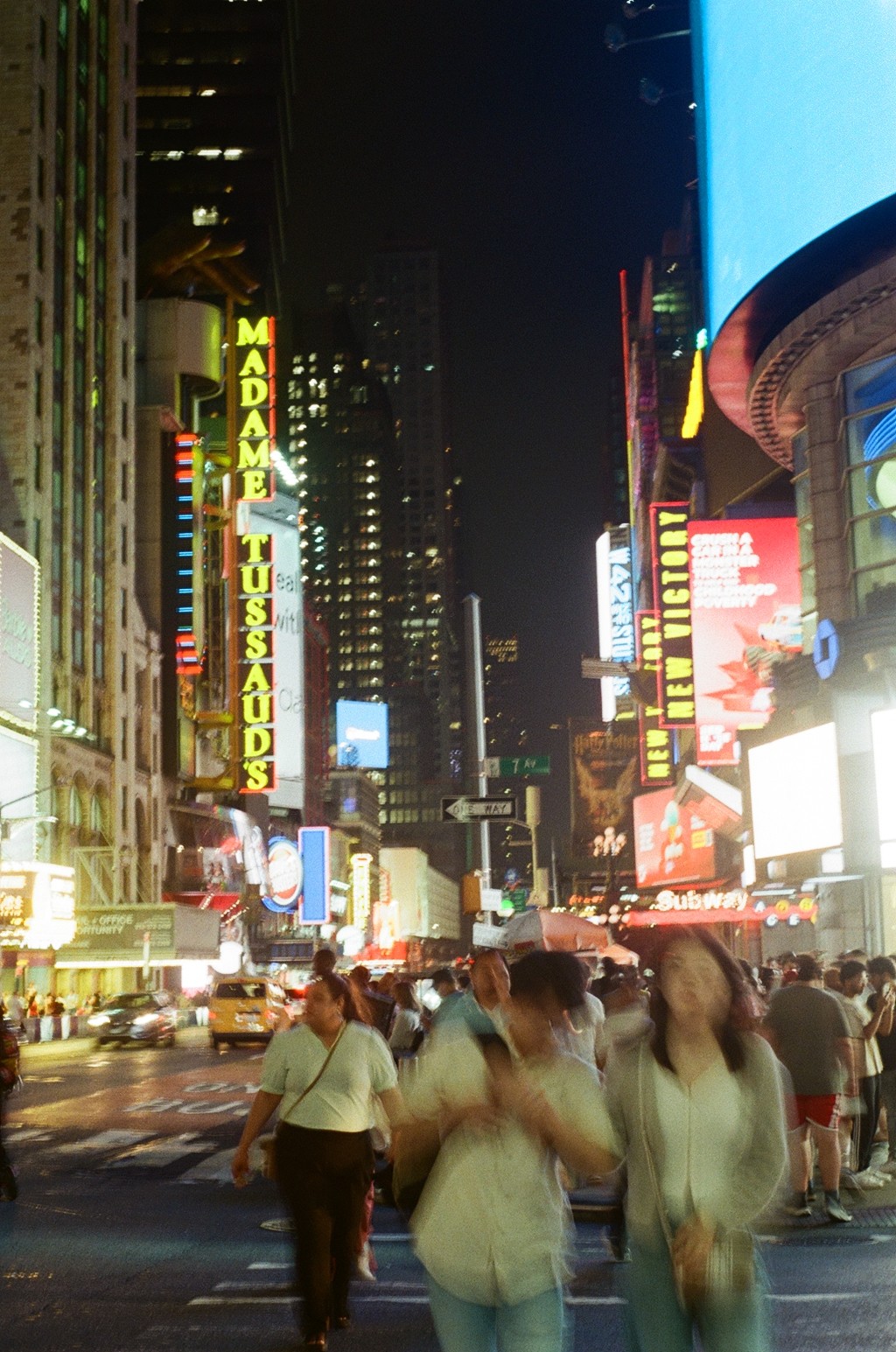 a cell phone leaning on a ledge