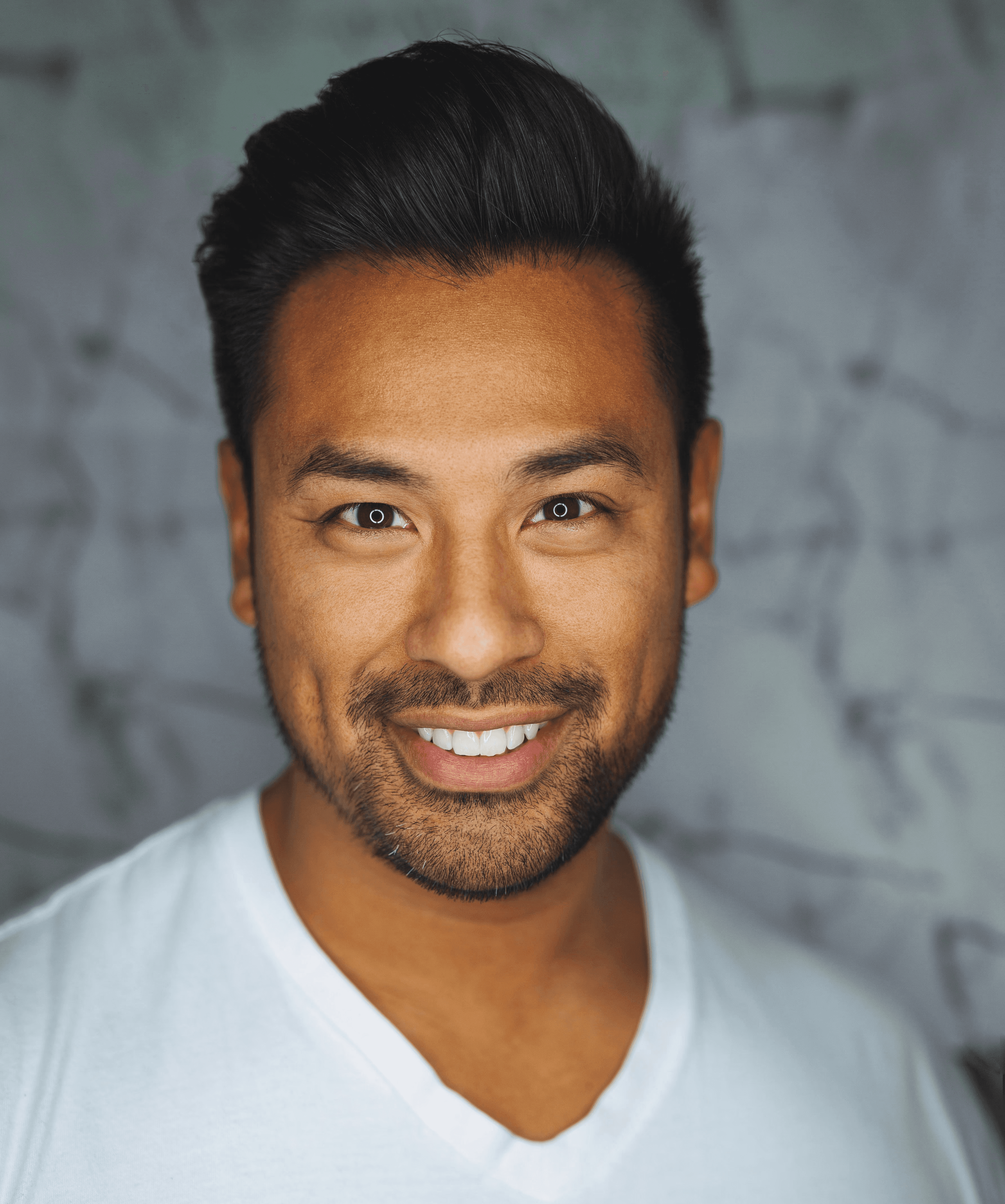 man wearing white V-neck shirt