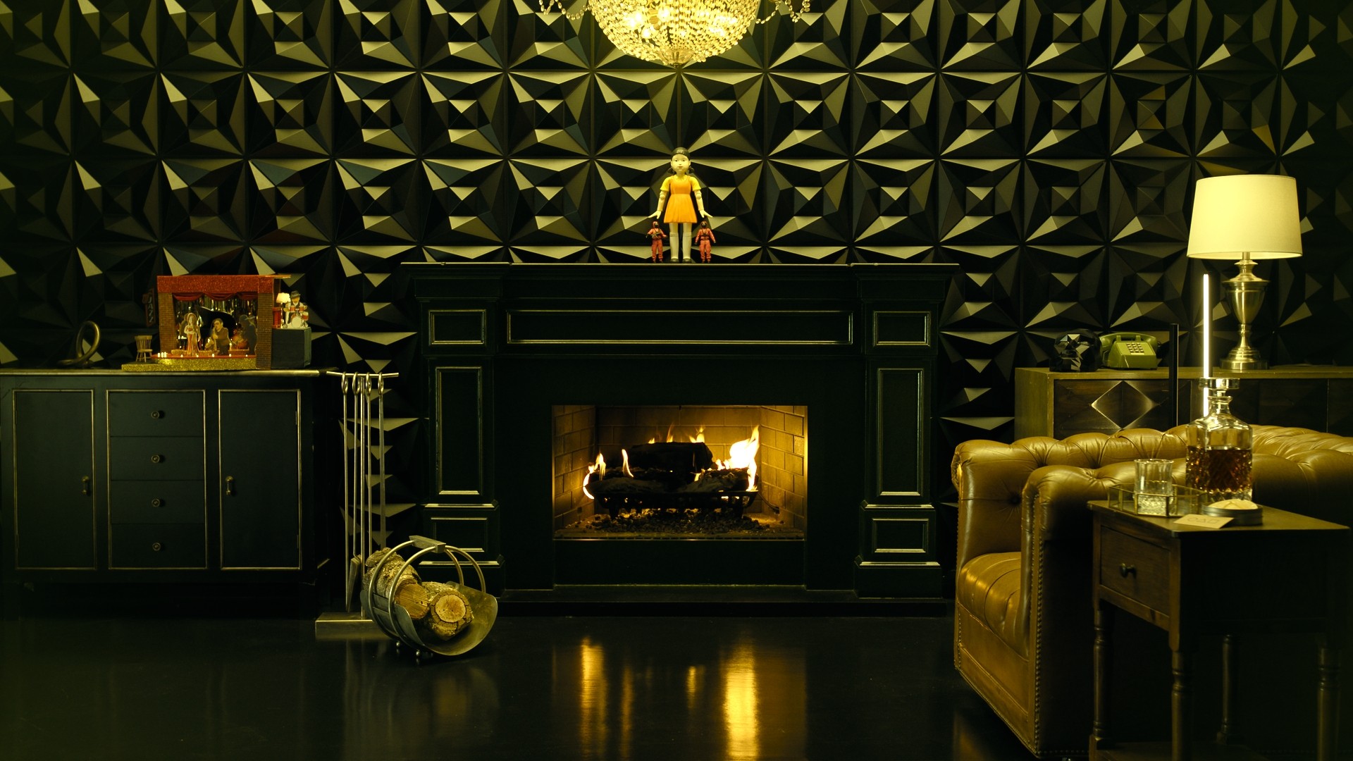 Woman sketching in a notebook at a desk with a plant backdrop.