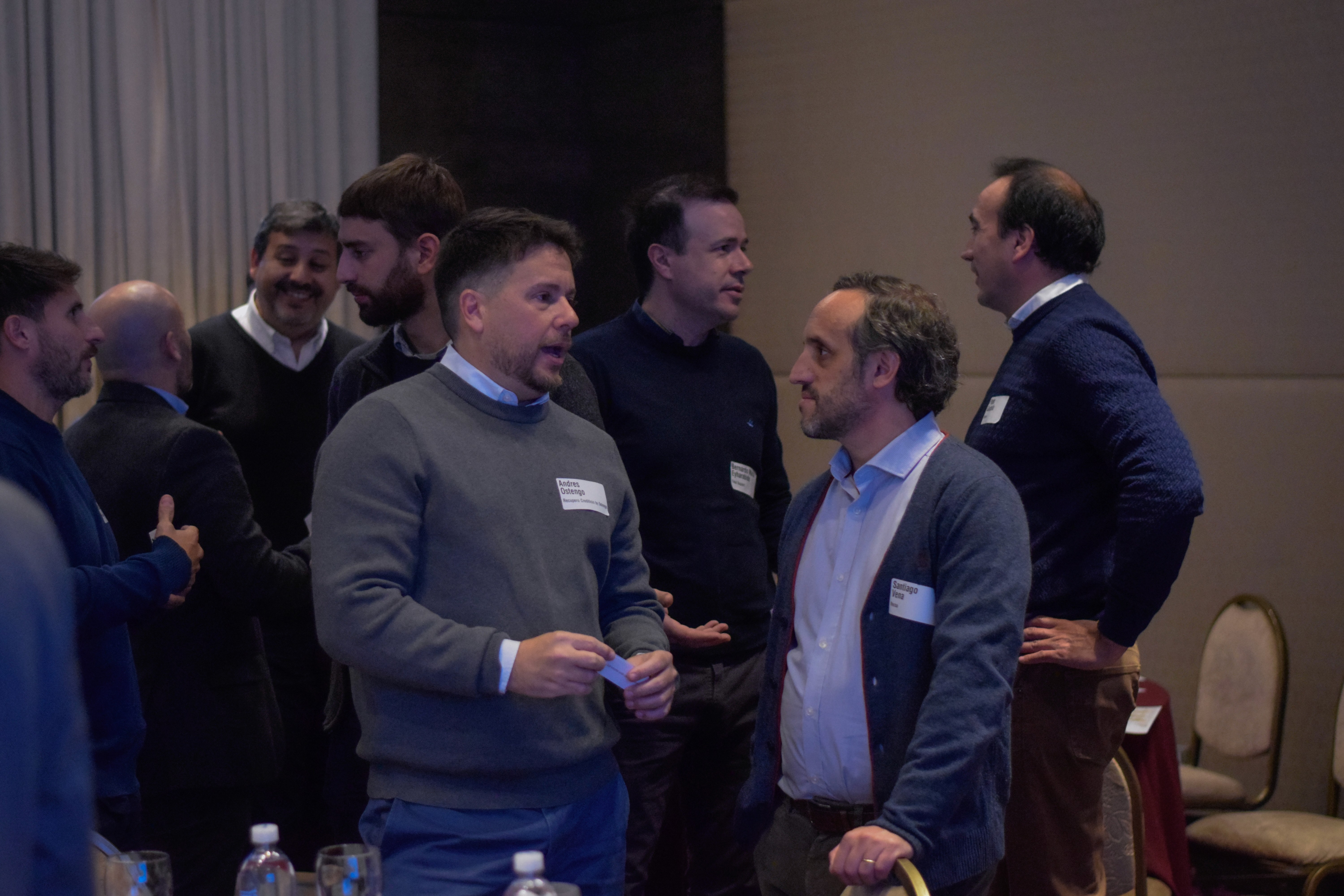 A Man Talking using Microphone in the Conference Room