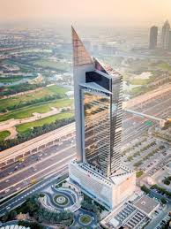 Iconic glass architecture of Arenco Tower. Your dedicated real estate agent for business hub properties.