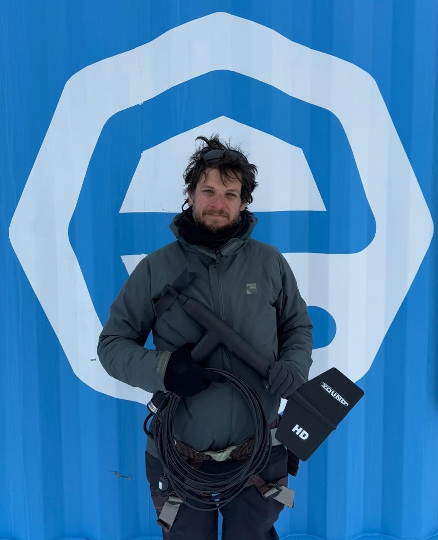 Close-up portrait with neutral expression and light hair