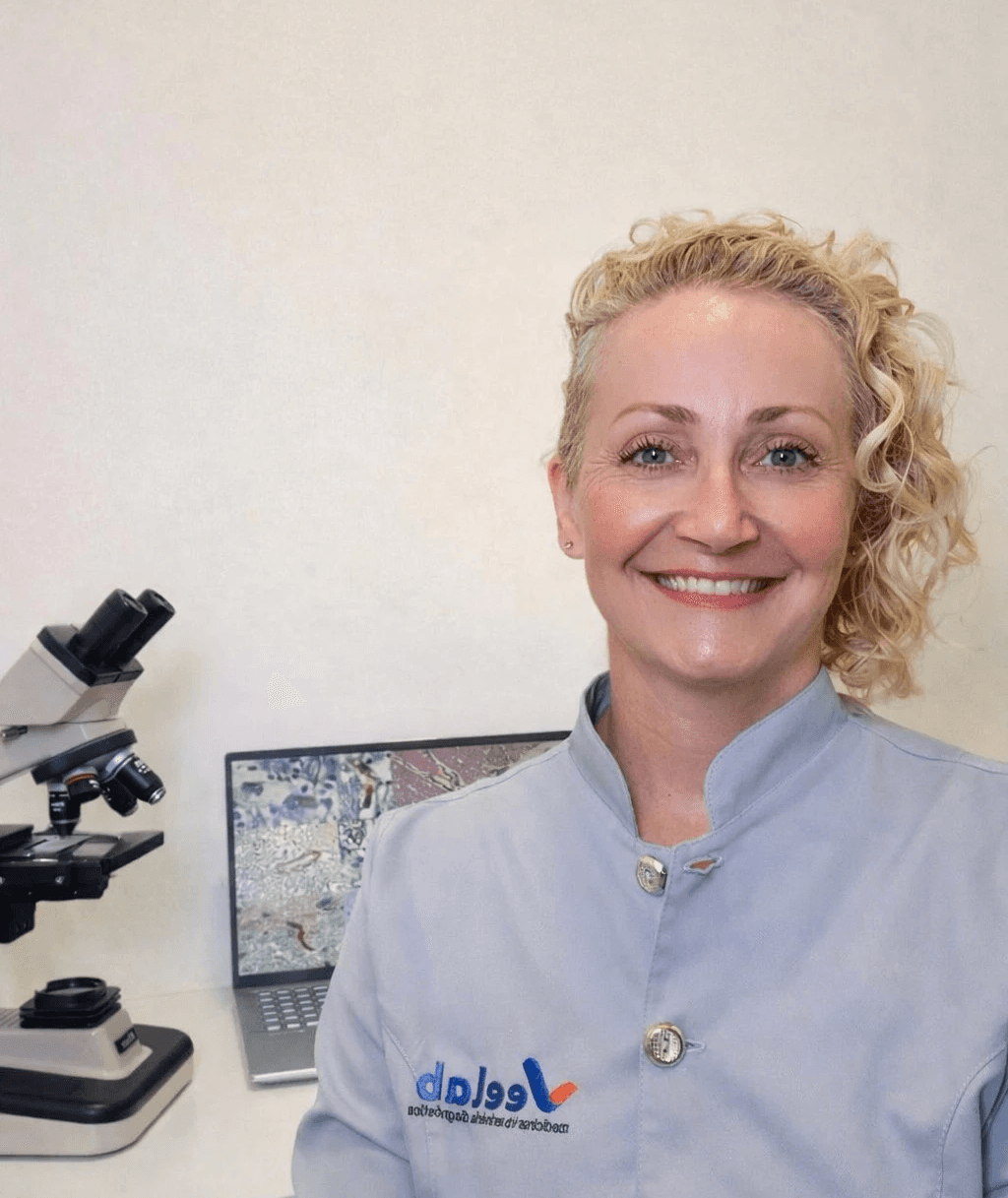 man in blue crew neck t-shirt smiling