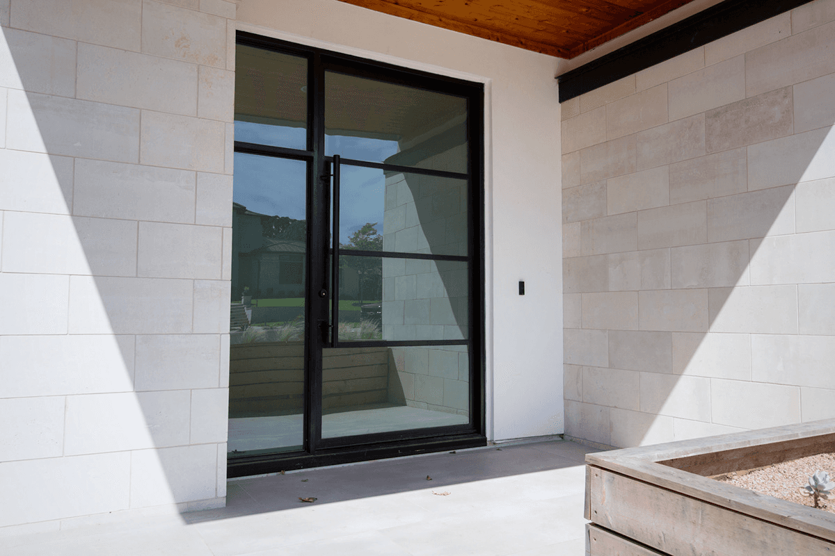 Traditional wrought iron double doors by M2 Metals Iron Doors DFW