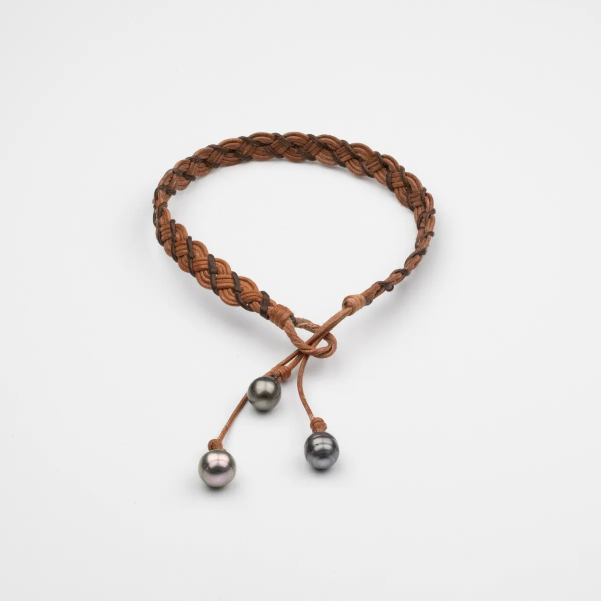 Tahitian Pearl choker necklace with cognac braided leather cord and three baroque pearls on hanging strands — Manos de Oro Saint Barth