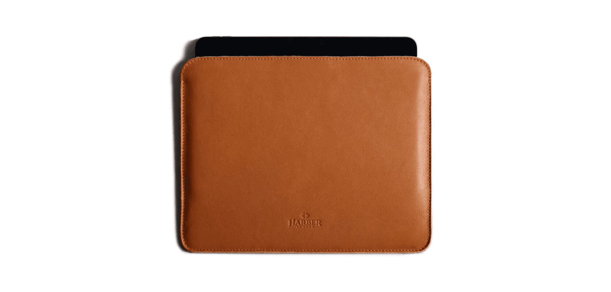 Tan leather laptop sleeve from Harber London with minimalist stitching and a slim, elegant profile.