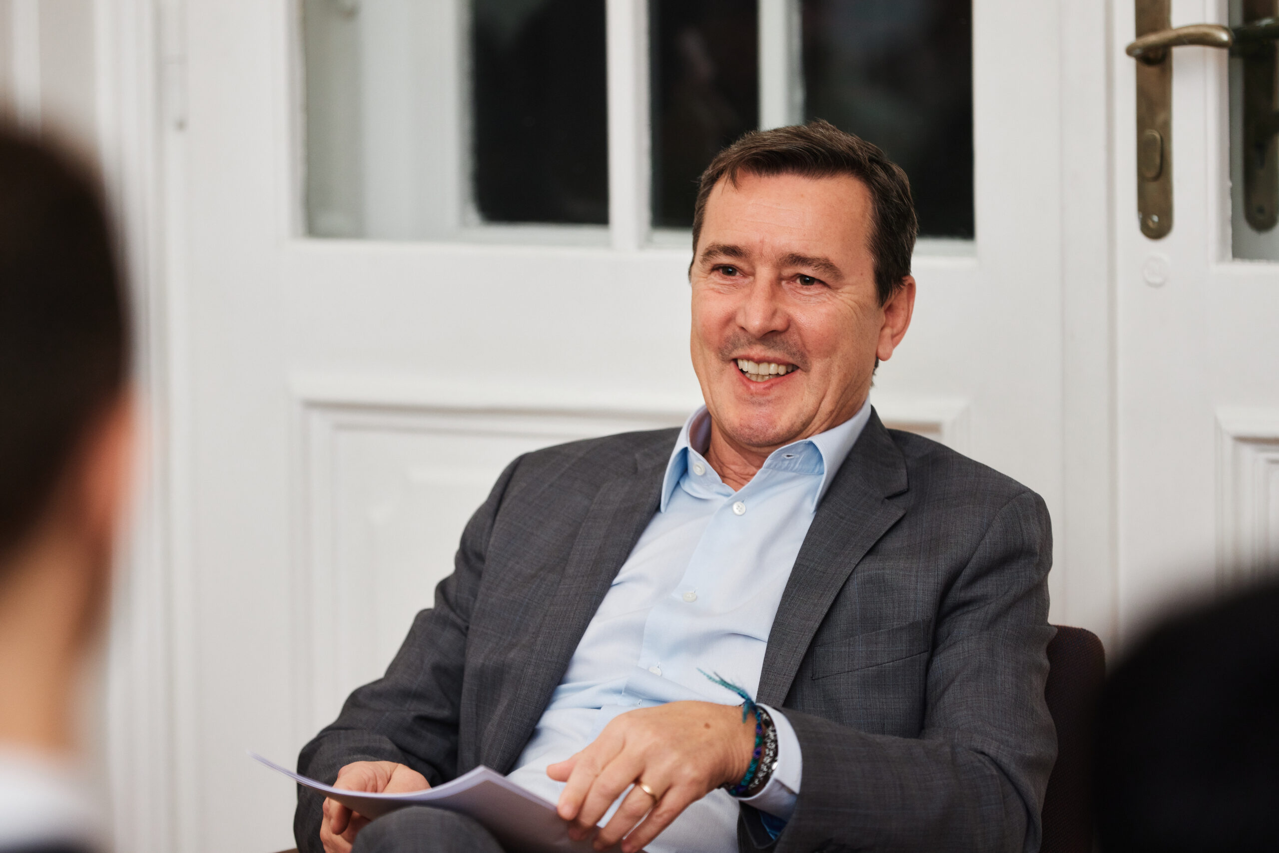  Mag. Roland Schöbel, Partner and Member of the Territorial Leadership Team at PwC Austria talking to LBS students