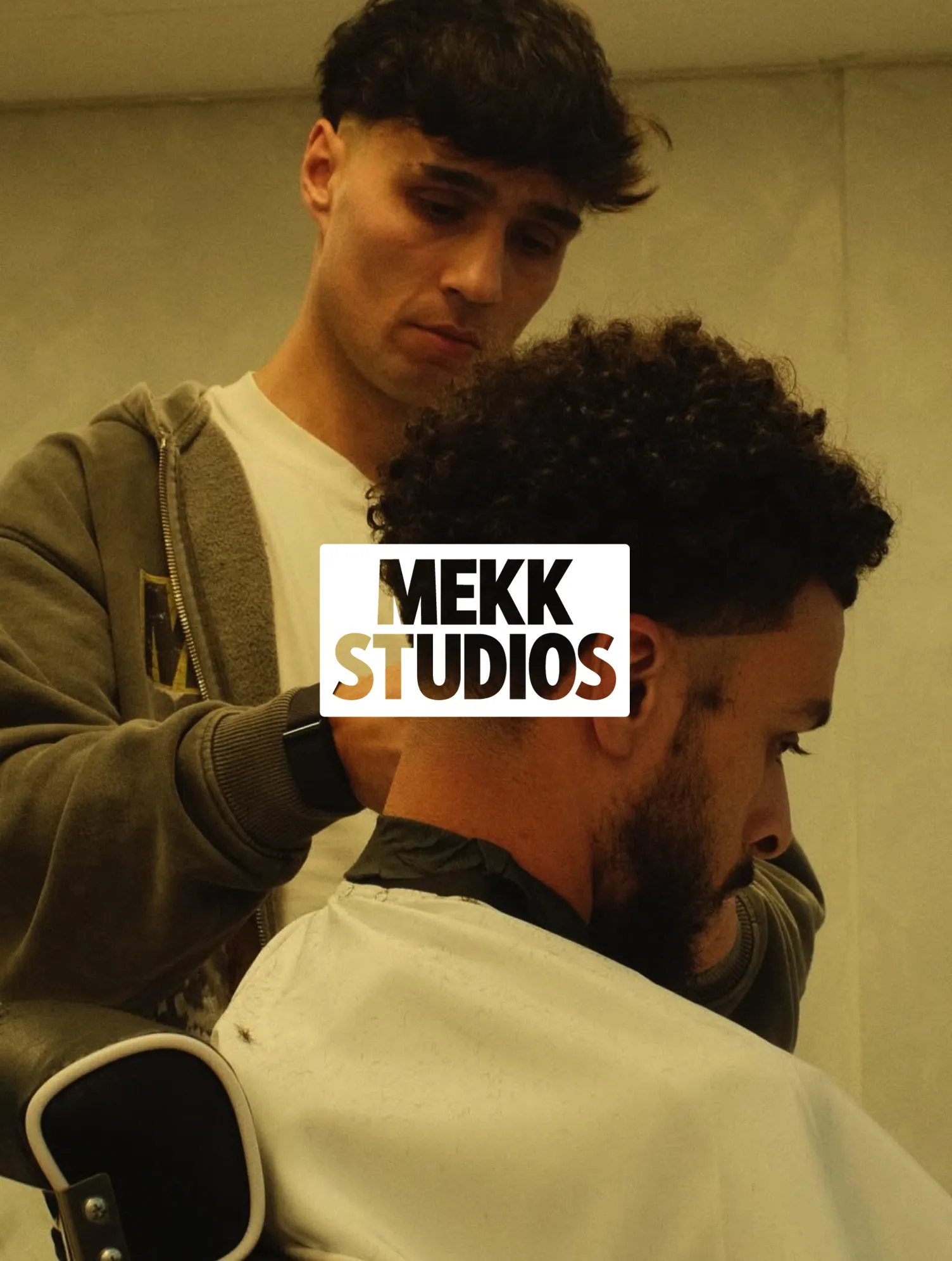 Barber Cutting Clients Hair.