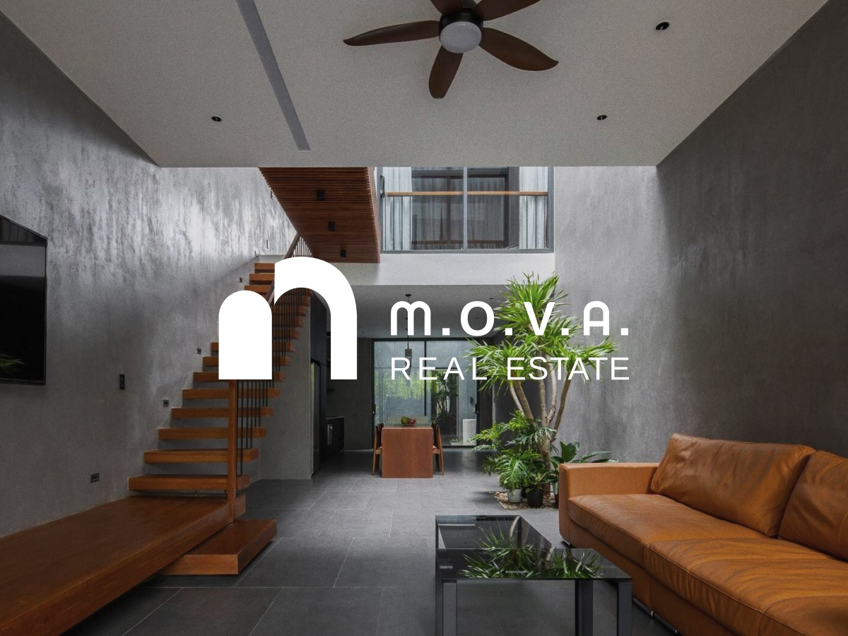 M.O.V.A. Real Estate branding over modern luxury residential interior