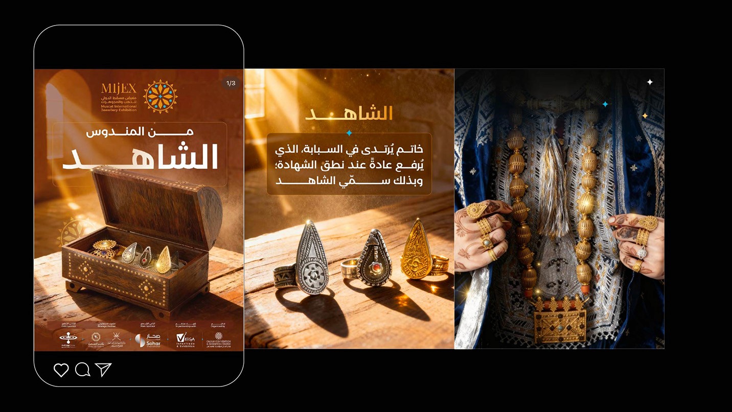 Sunlit meadow with trees and mountains in background