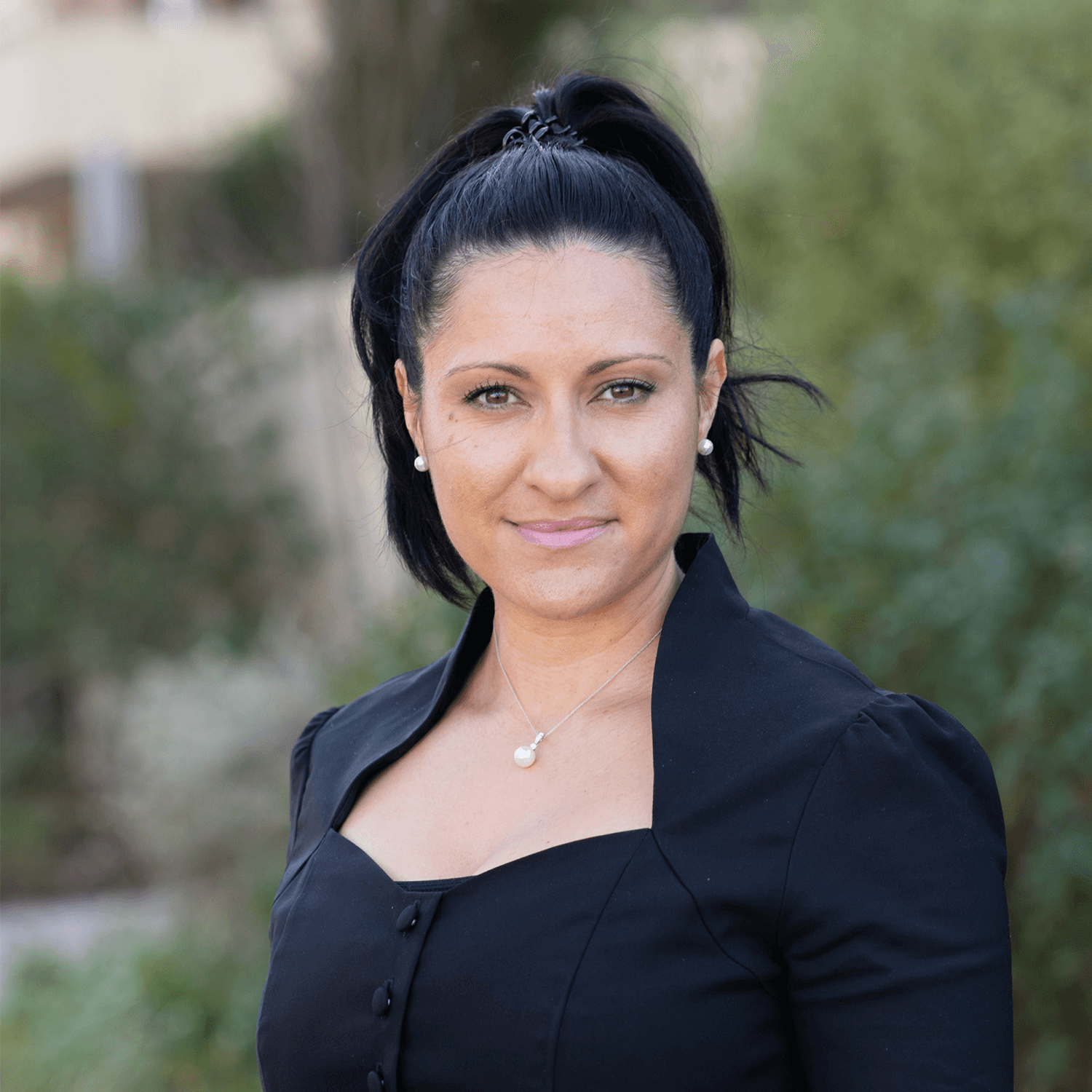 Young woman looking at the camera wearing black shirt