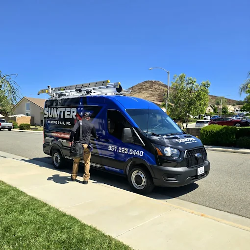 Sumter technician beside service van