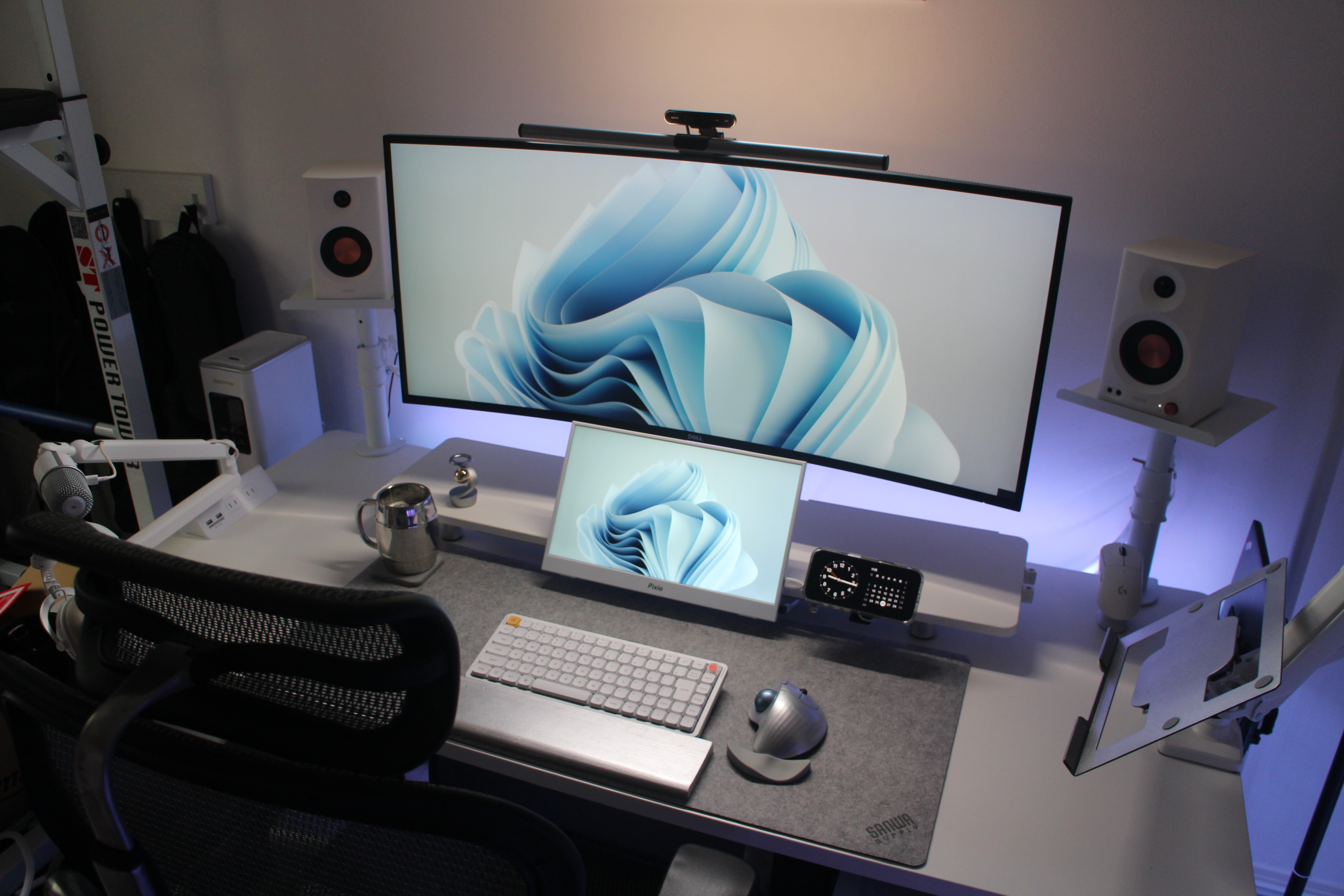 Dark desk setup with monitor