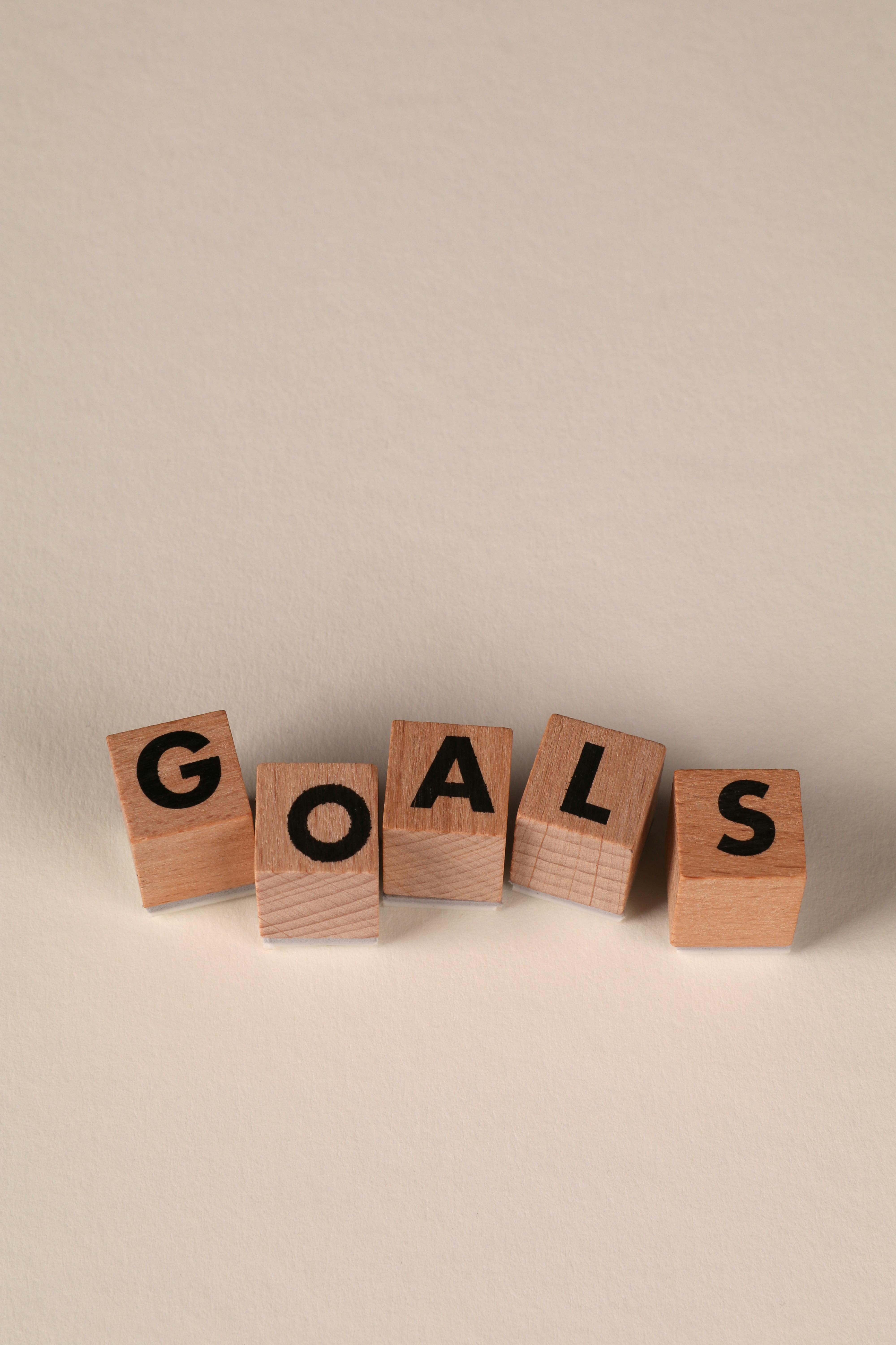 Wooden blocks that spell out "goals"
