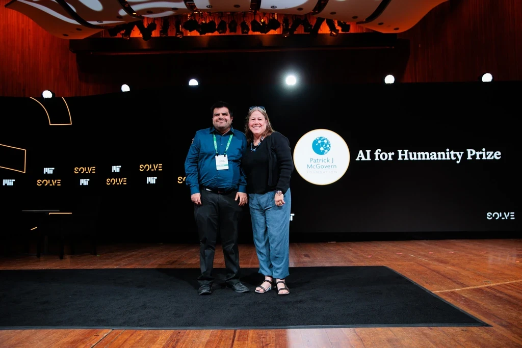 Our founder Kartik on stage at an MIT Solve event.