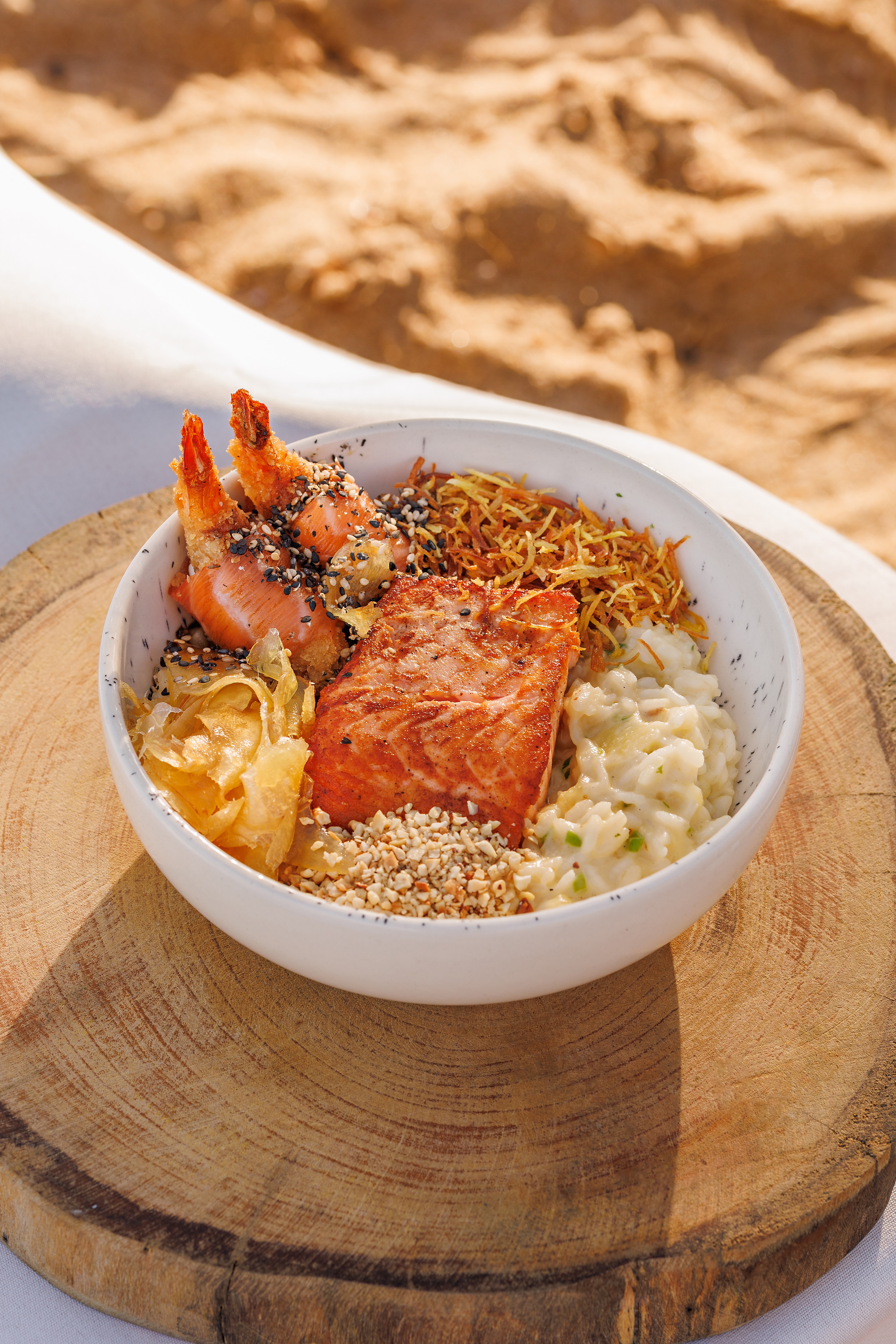 A man standing with Sufboard