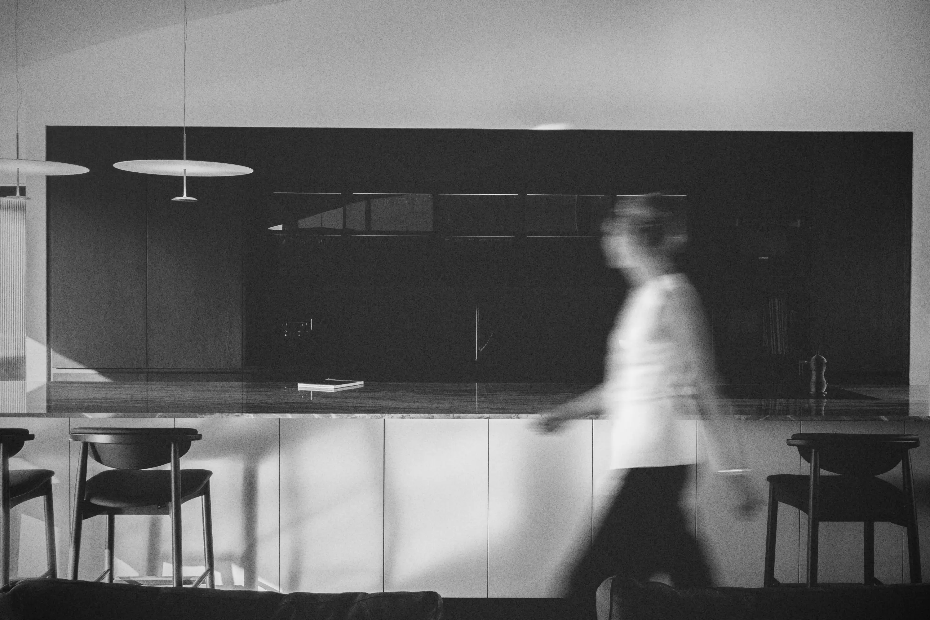 someone walking in black and white mode