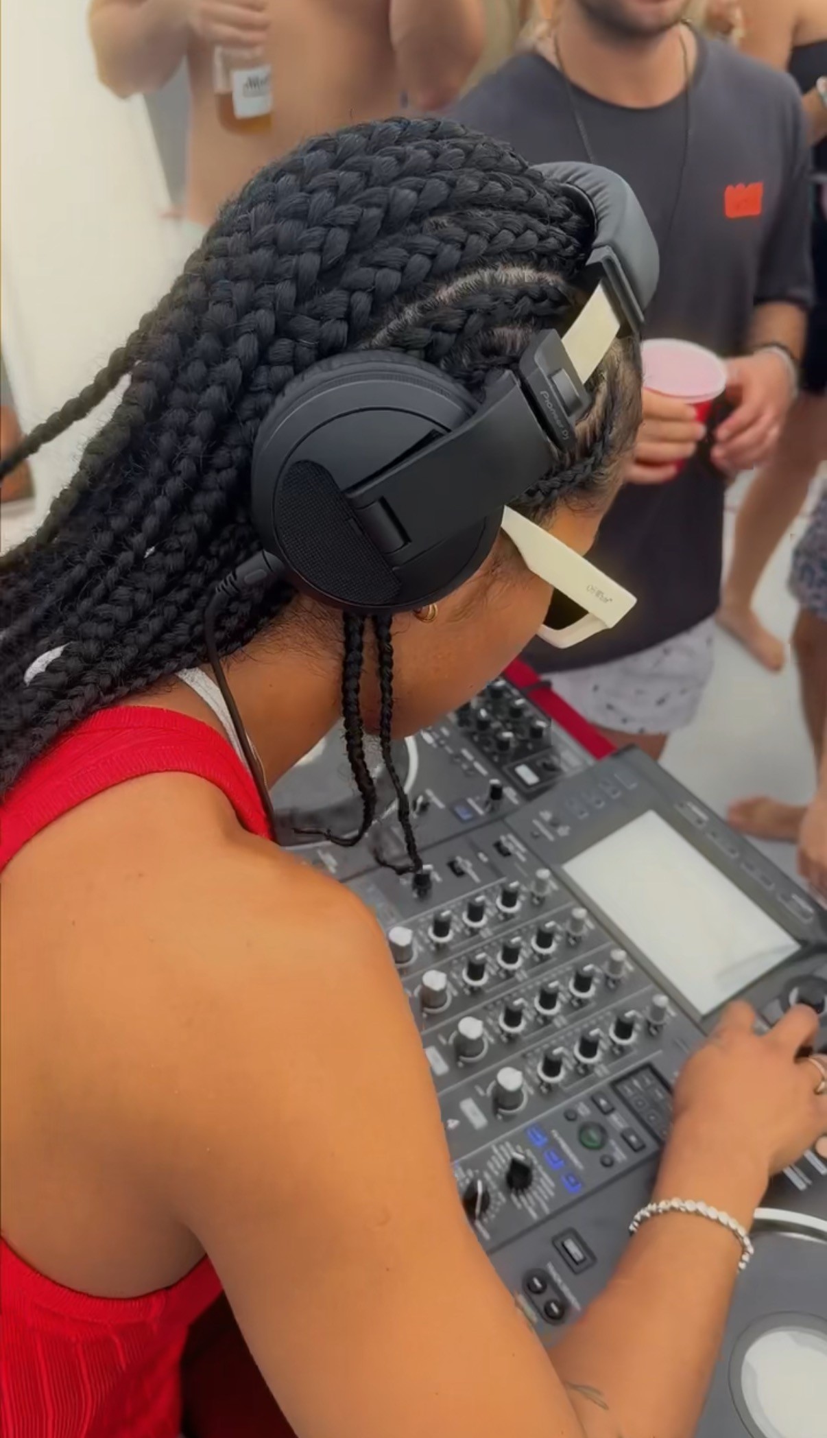 a boat on a river with buildings on either side of it