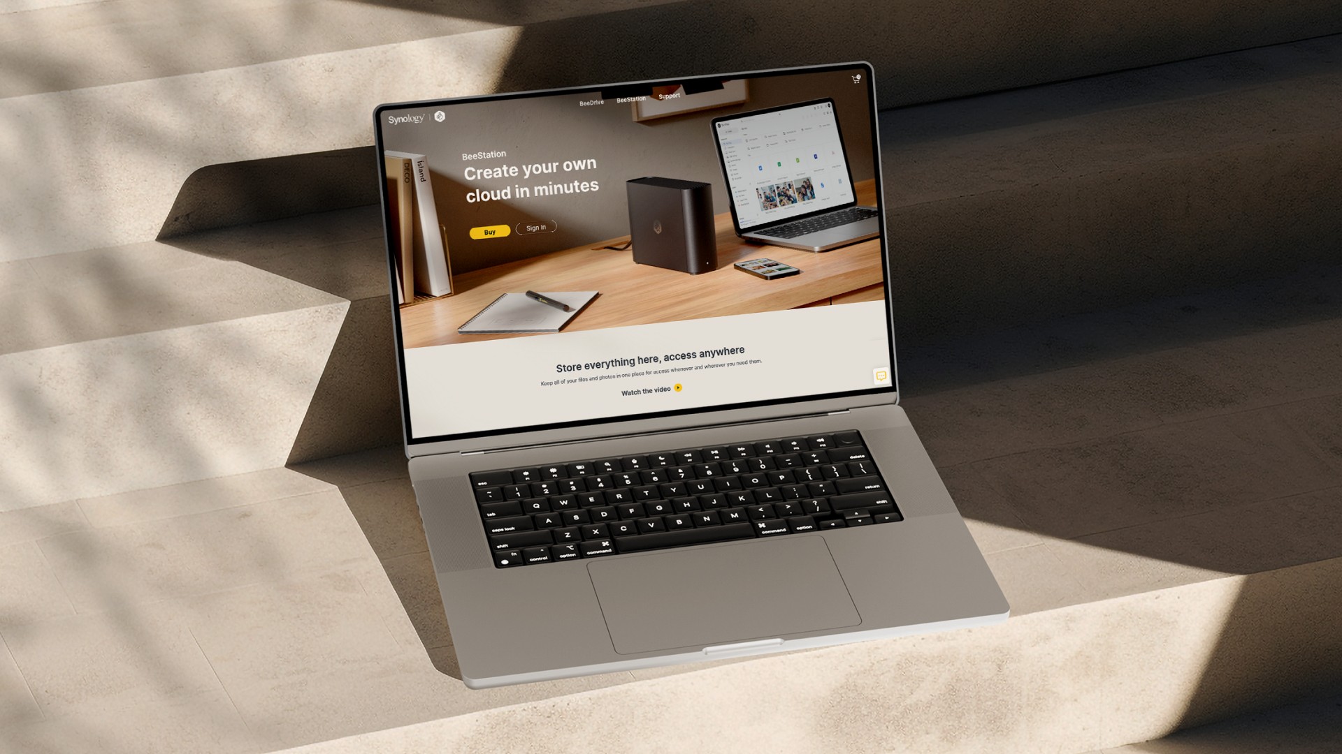 Stack of modern books and magazine with minimalist cover design on leather chair