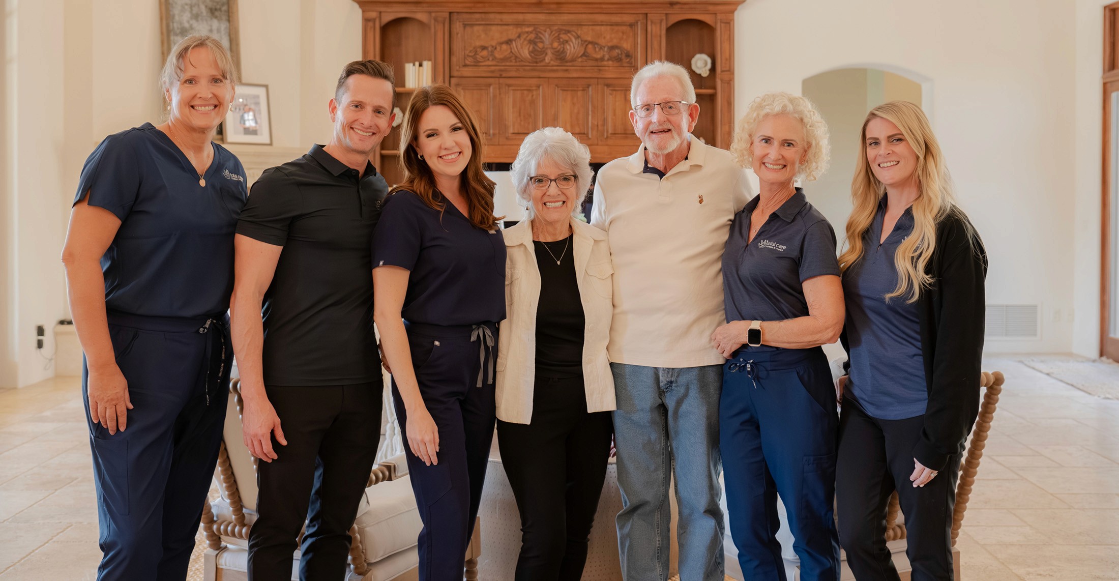 The Total Care Connections team posing with clients