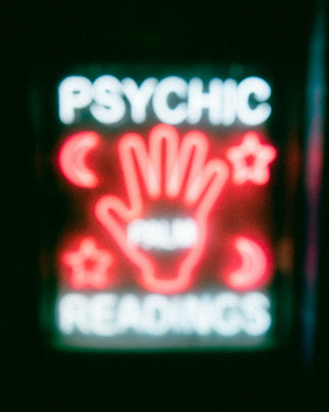 Neon 'Psychic Readings' sign, a thematic visual for Almon Blackwood’s mystery series.