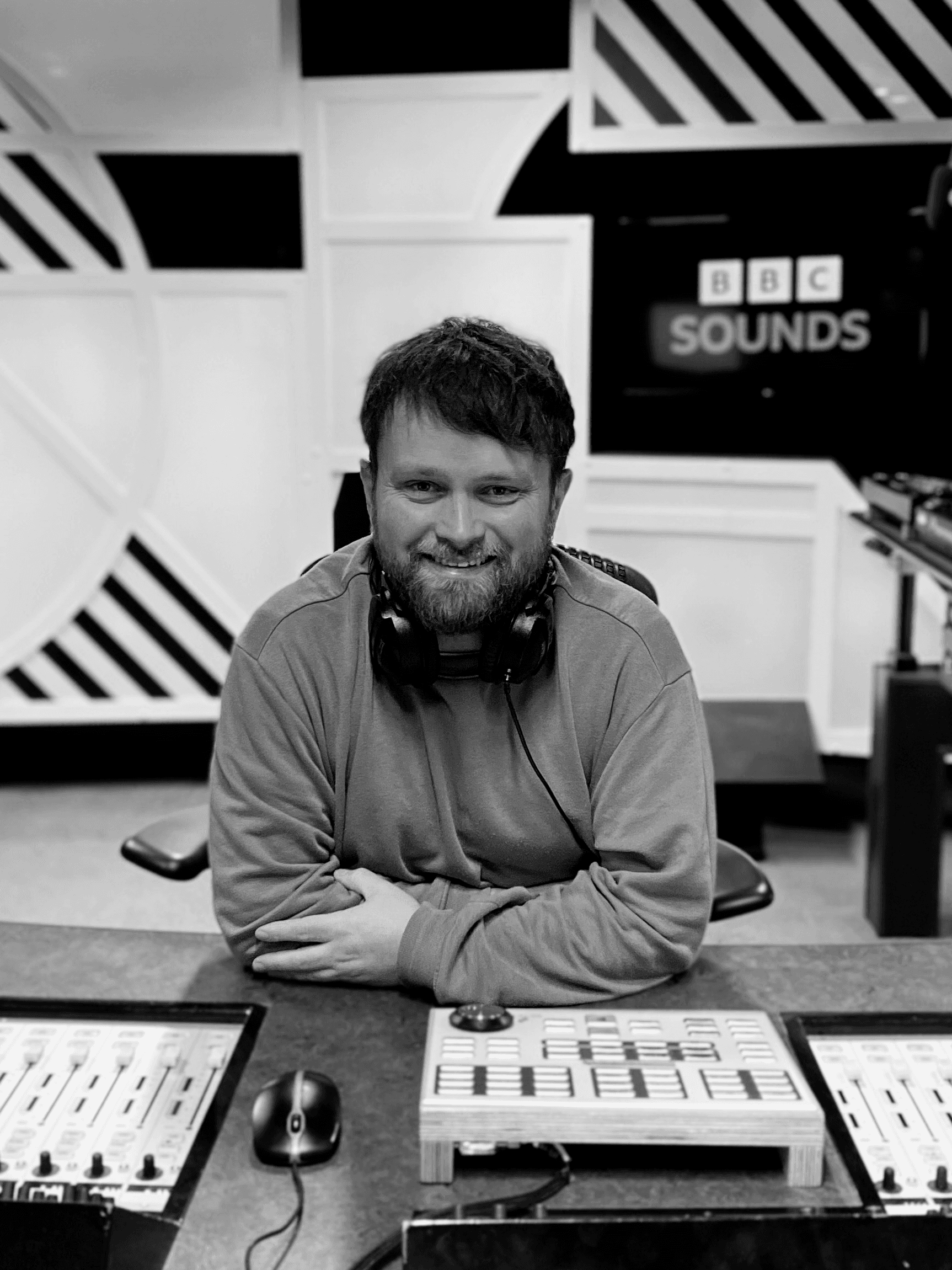 a blurry photo of a person standing in front of a wall